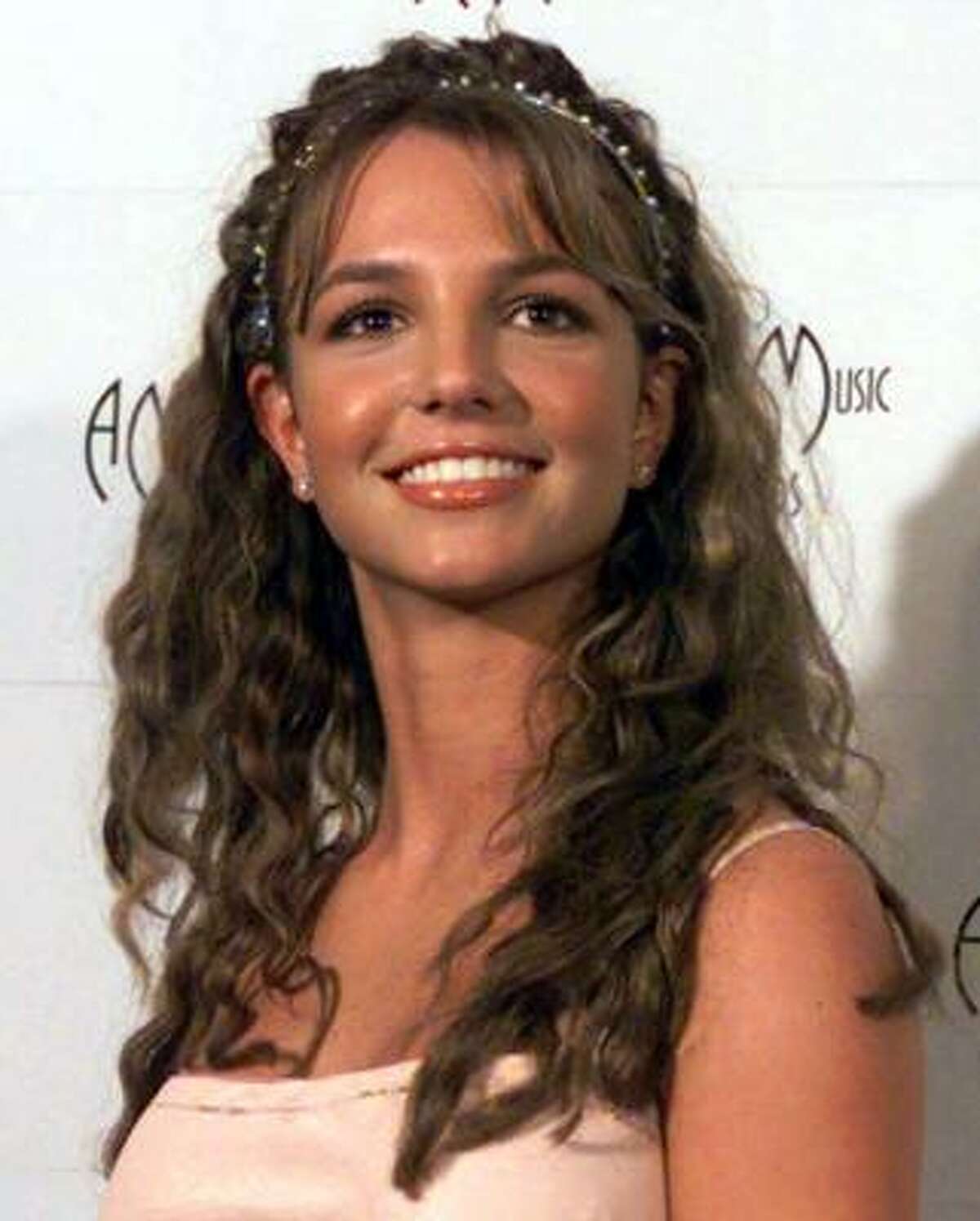 January 1999: Britney Spears at the 26th annual American Music Awards. When the American Family Association slammed her sexy girl image, Britney famously proclaimed she would remain a virgin until marriage.