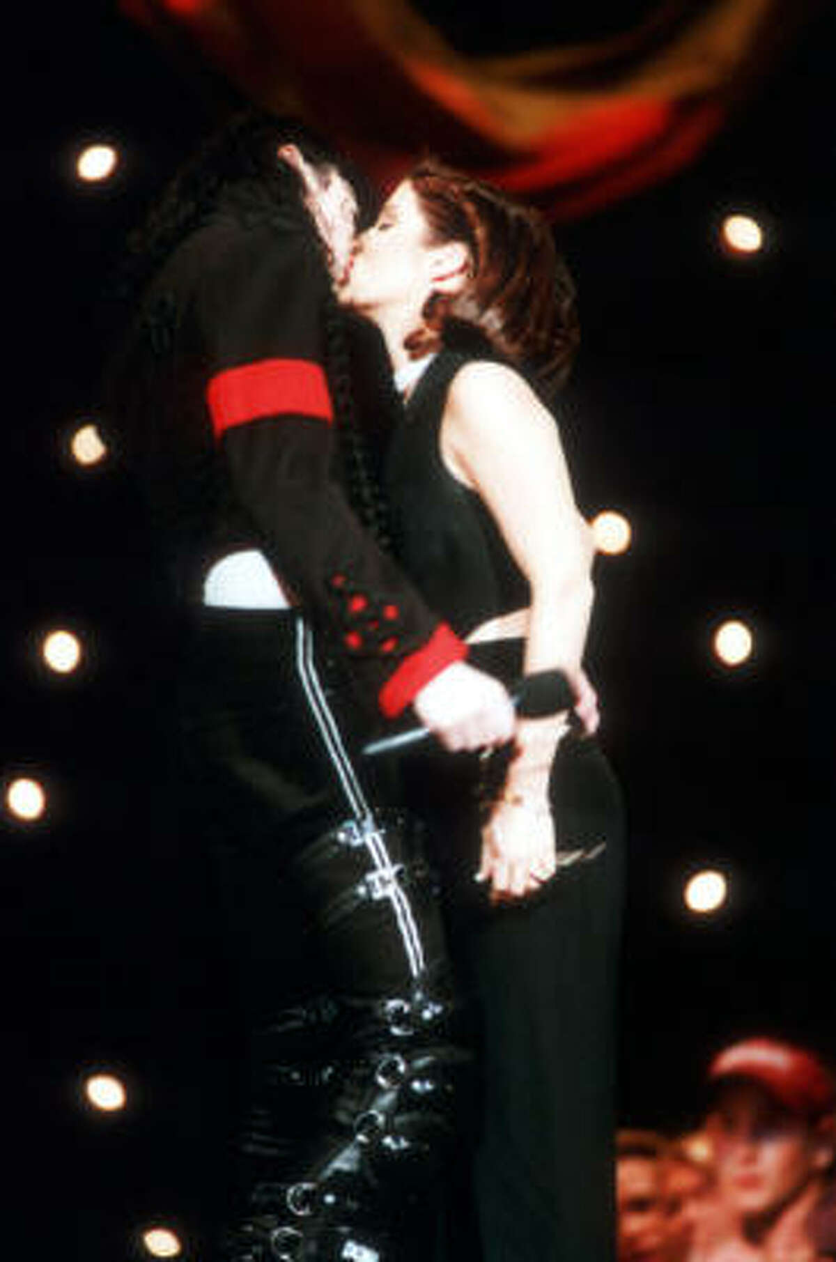 Or it can be to prove a point. Such as the "we're so in love" kiss between Michael Jackson and Lisa Marie Presley-Jackson after they opened the 11th annual MTV Video Music Awards.