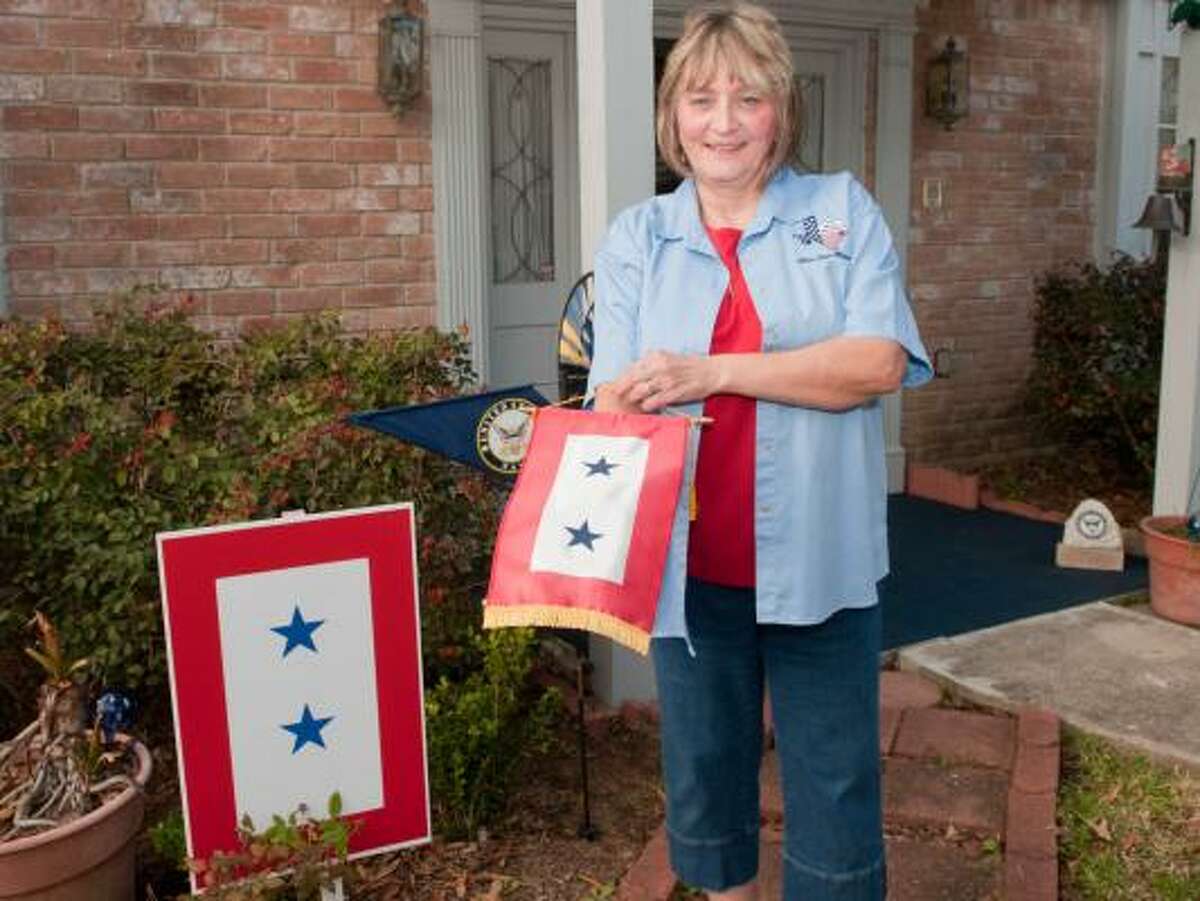 DISPLAY OF PATRIOTISM: Jodie Seeger has two sons who serve in the U.S. Navy. Seeger is teacher at Clear Lake High School, and founding president of the Texas Bay Area Blue Star Moms.