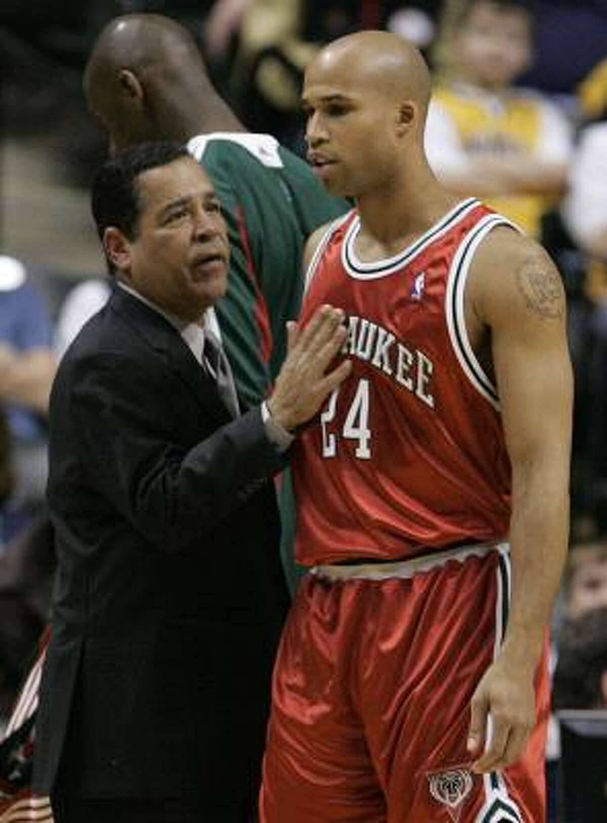 Bucks assistant coach Kelvin Sampson, left, served as head coach at Indiana and Oklahoma before moving to the NBA.