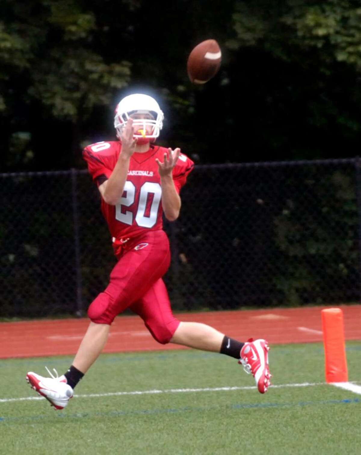 Greenwich High's Colin Dunster floats into the endzone to catch a touchdown pass as the Greenwich High football team hosts Harding High School for the Greenwich Homecoming game Saturday afternoon, Oct. 3, 2009.
