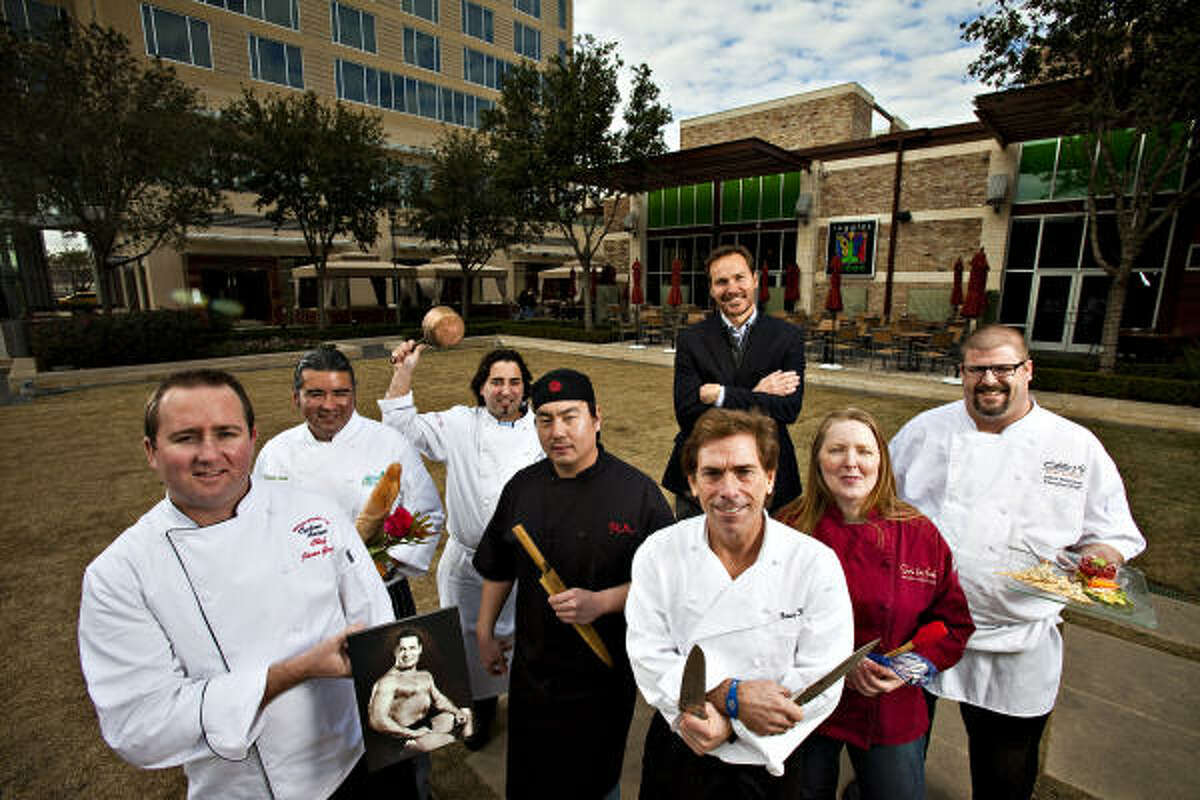 At CityCentre, from left, chefs David Luna of flora & muse; Jason Gould of Cyclone Anaya's; Juan Carlos Gonzalez of Bistro Alex; Jerry Jan of RA Sushi; CityCentre executive Jonathan Brinsden (back); Bruce Molzan of Ruggles Green; Jamie Williams of Sur La Table; and Jason Robinson of Eddie V's.