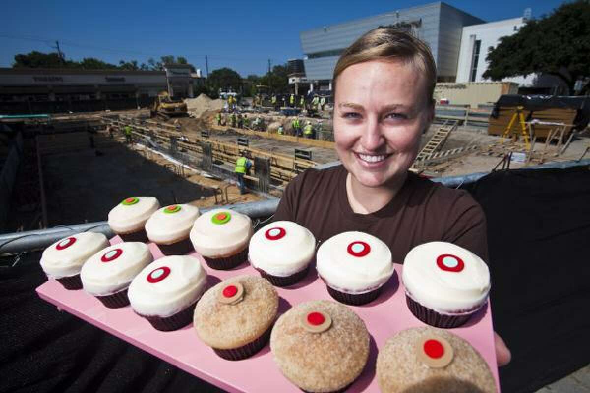 Sprinkles Cupcakes manager Julie Linhart has lots of goodies to sell - when customers find the shop. Sprinkles President Charles Nelson says he's glad to be in a prime Highland Village spot, but he regularly gets calls from people asking if the shop is open as work goes on around the shop.