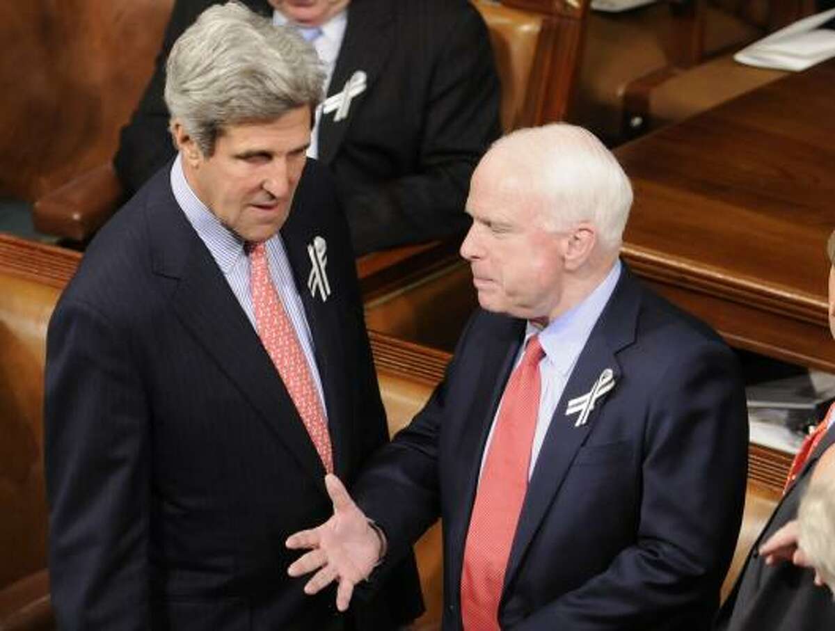 GOP Sen. John McCain, right, talking before the address with Democratic Sen. John Kerry, suggested he was looking forward to less "jumping up and down" in his seat.