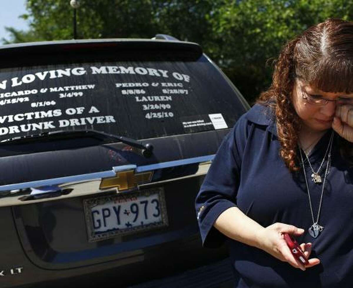 Christi Zamarripa, of San Antonio, lost both of her sons to drunken drivers. A sign on her vehicle aims to raise awareness of the problem. She says nothing will change until those who provide the alcohol face tougher penalties.