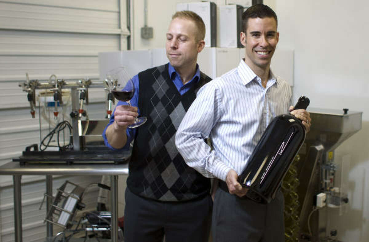 Nice Wines partners Ian Eastveld, left, and Ryan Levy have a wine mixing lab in Houston and recently won gold medals for their estate-bottled selections at the Houston Livestock Show and Rodeo wine competition.