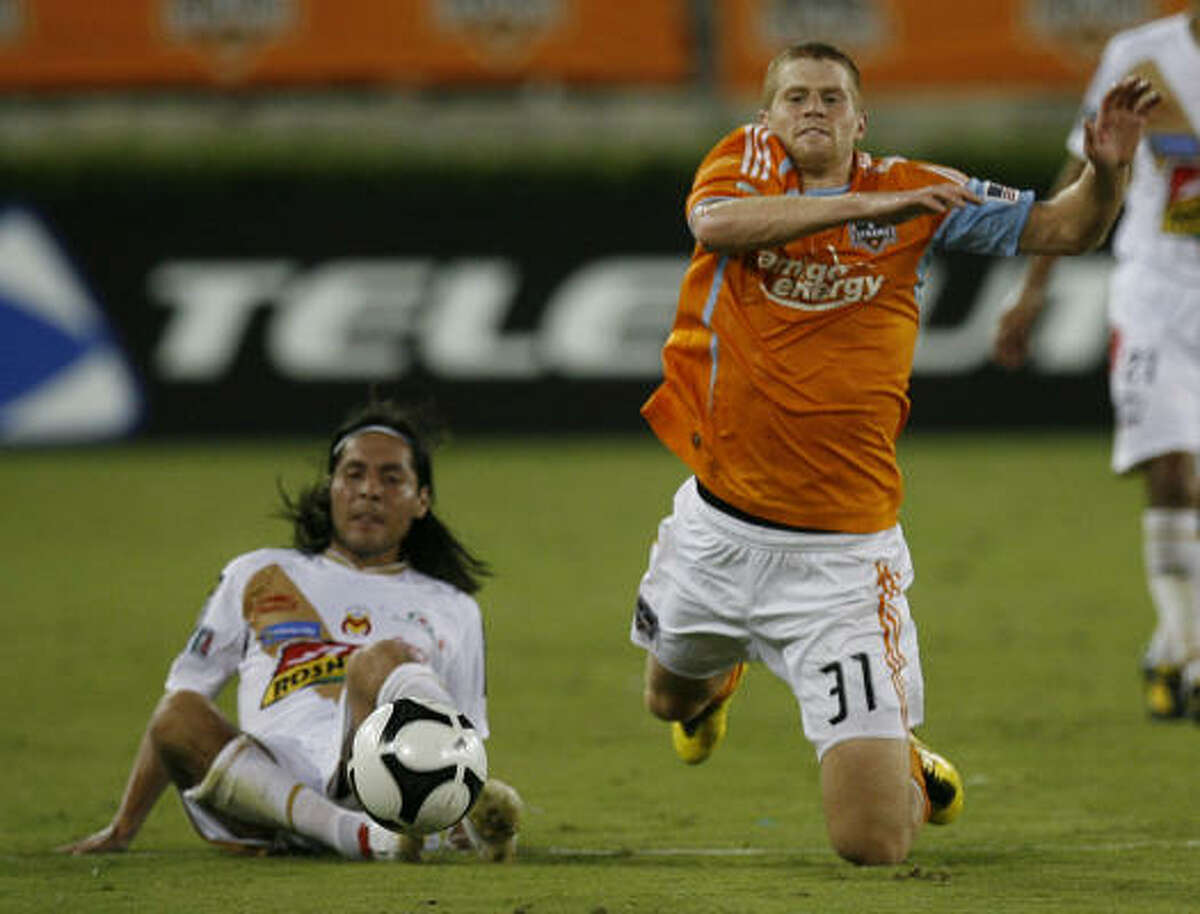 Andre Hainault, right, is one of the Dynamo's walking wounded who expects to be able to play Saturday.