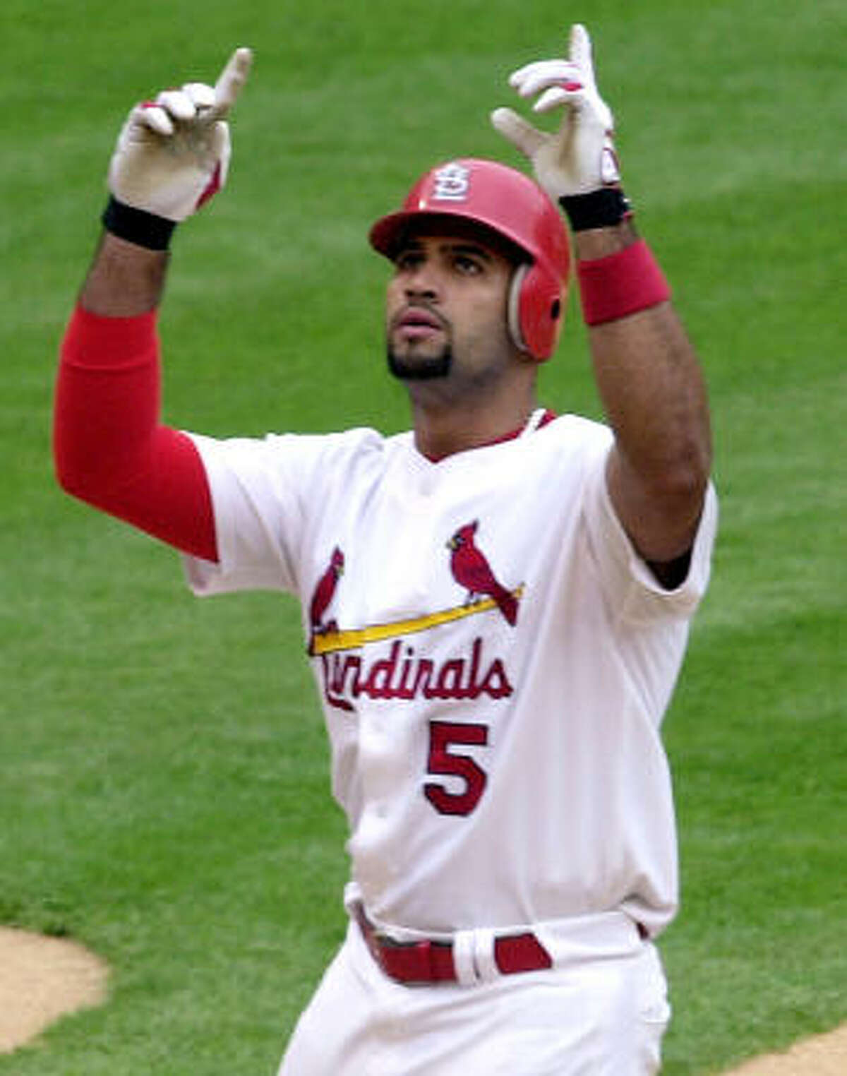 As Christian athlete, should Pujols strike out on big money?