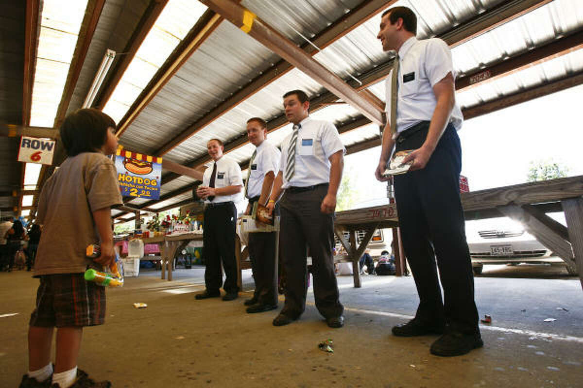 2. Mormon Weekly or more: 77 percent Monthly or yearly: 14 percent Seldom to never: 9 percent Don't know or refused: 1 percent Pictured: Elders Aaron Porter, from left, Sean Herrmann, Wayland McGary and Aaron Allbee talk with a boy about the Mormon faith during a weekly visit to a flea market popular with Hispanics in north Houston.