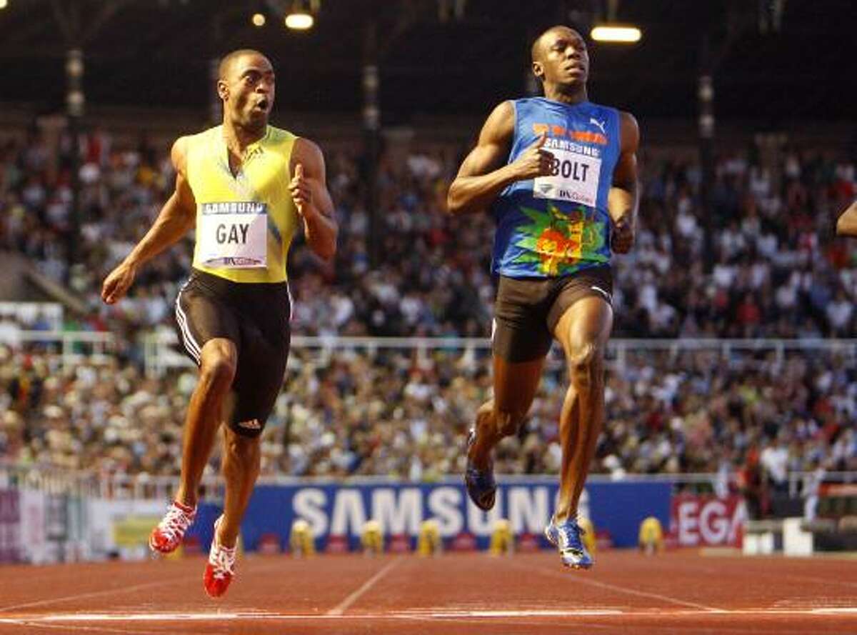 American sprinter Tyson Gay, left, beats Jamaican Usain Bolt in the 100 meters on Friday in Stockholm.