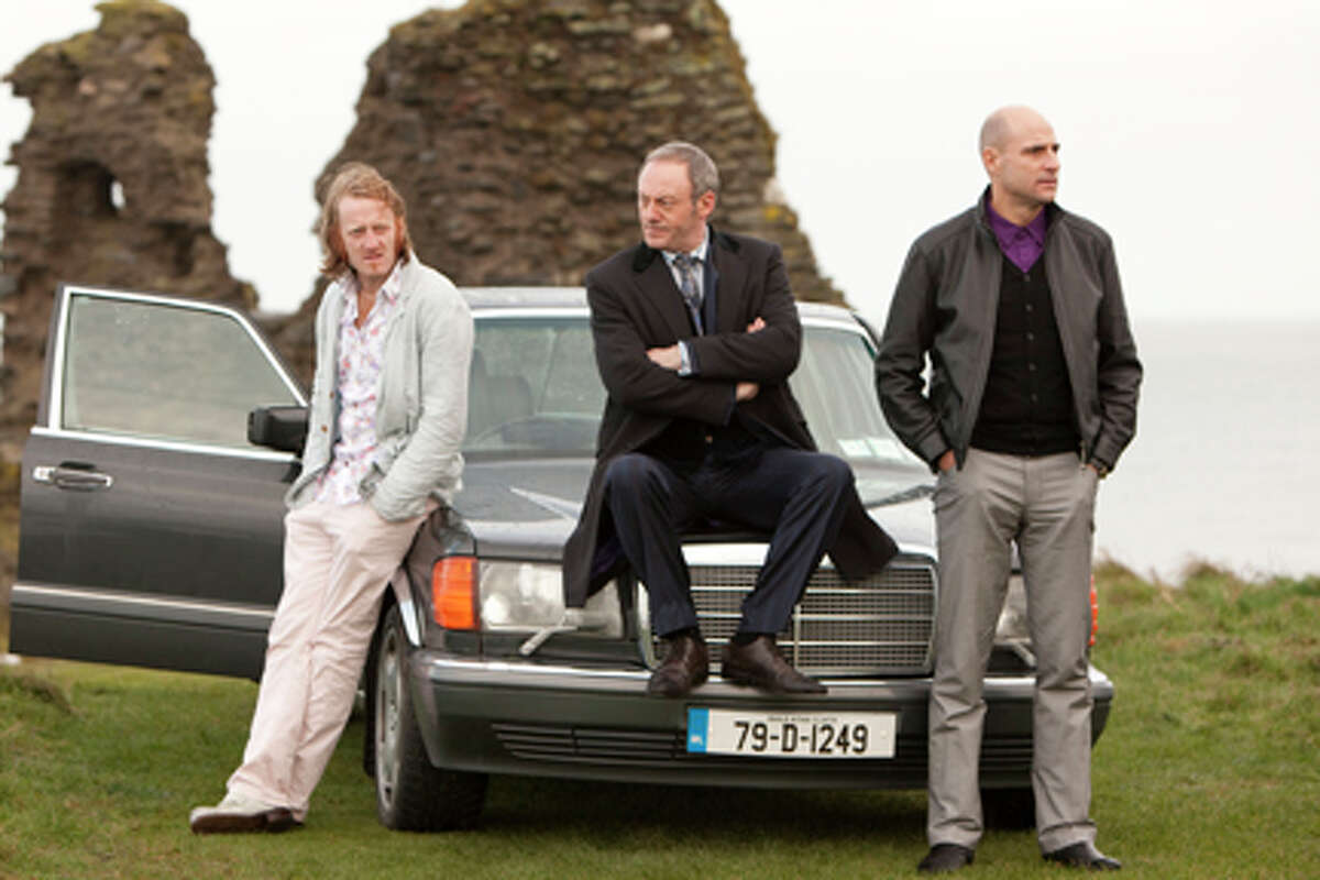 (L-R) David Wilmot as Liam O'Leary, Liam Cunningham as Francis Sheehy and Mark Strong as Clive Cornell in "The Guard."