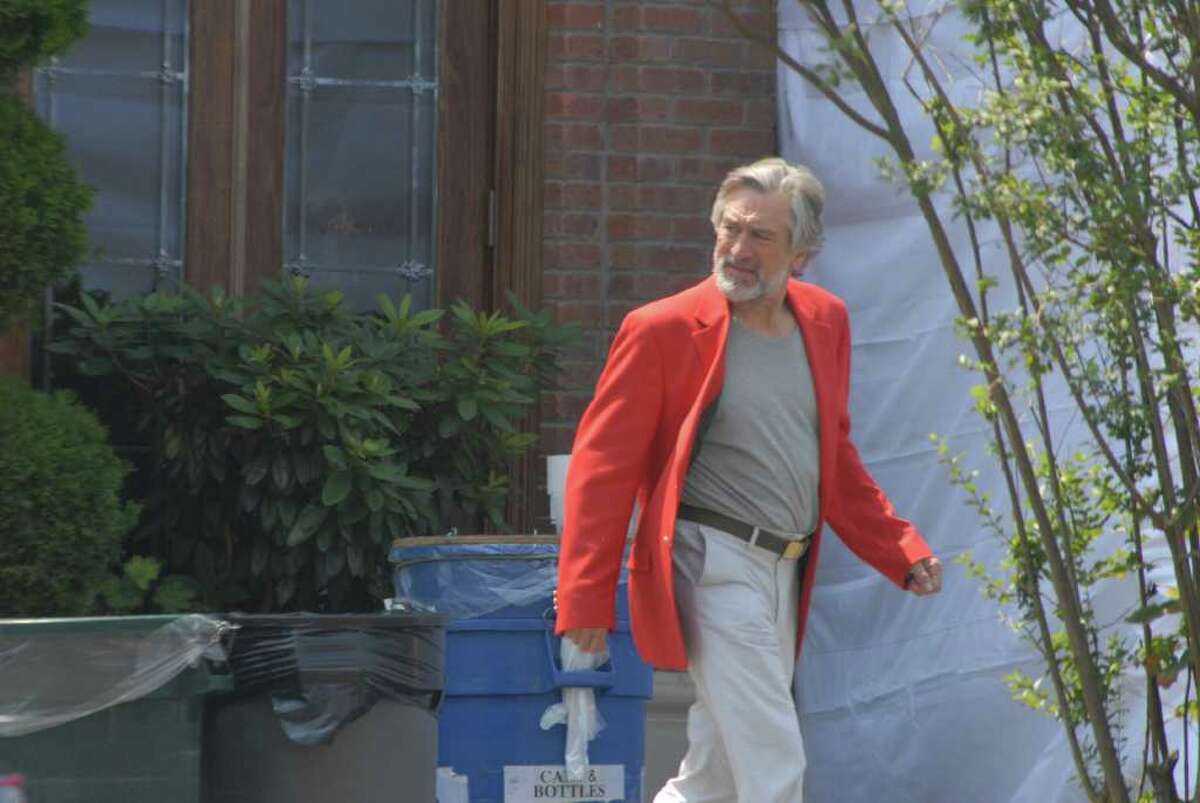 Actor Robert De Niro walks from the back of Gabriele's Italian Steakhouse on Church Street in Greenwich on Tuesday, Aug. 2, 2011. Scenes from the movie "The Wedding," starring De Niro, Diane Keaton, Robin Williams, Susan Sarandon, New Canaan native Katherine Heigl and Darien native Topher Grace, were filmed at the restaurant. Photo by John Ferris Robben
