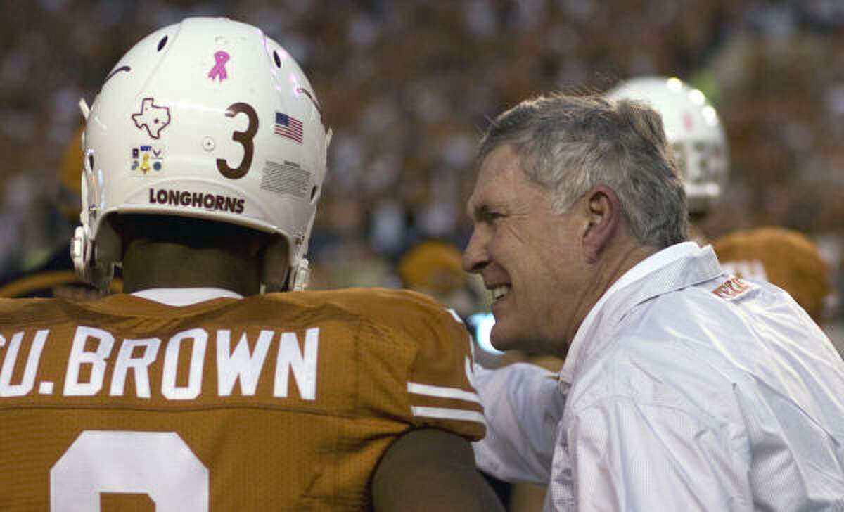 Even though Mack Brown, right, was questioning Curtis Brown about another mufffed punt Saturday, the Texas coach is sticking with the beleaguered senior as his return man.