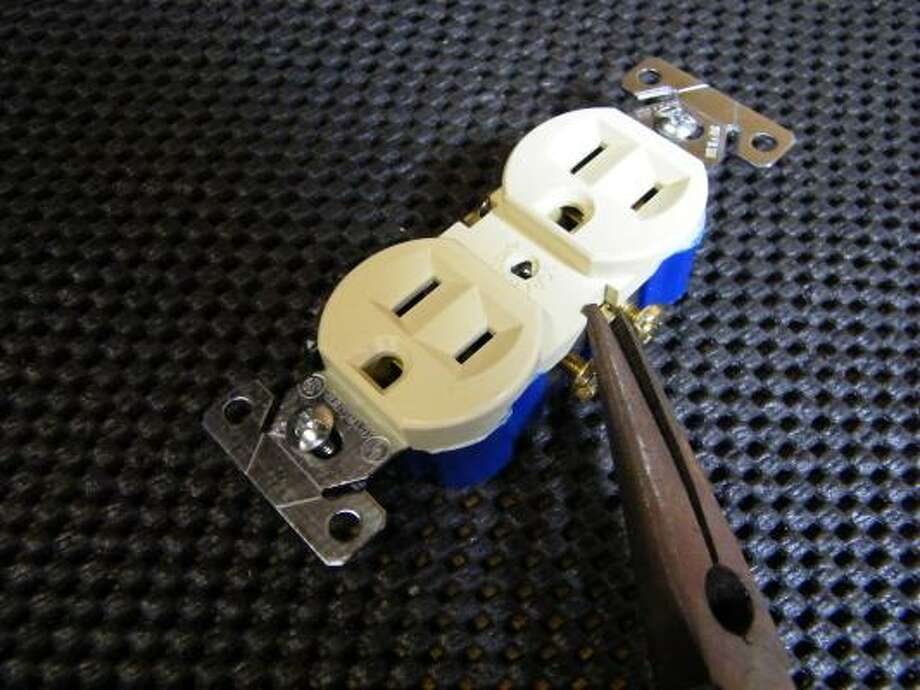 Electrical outlet tab secret to appliances operating independently