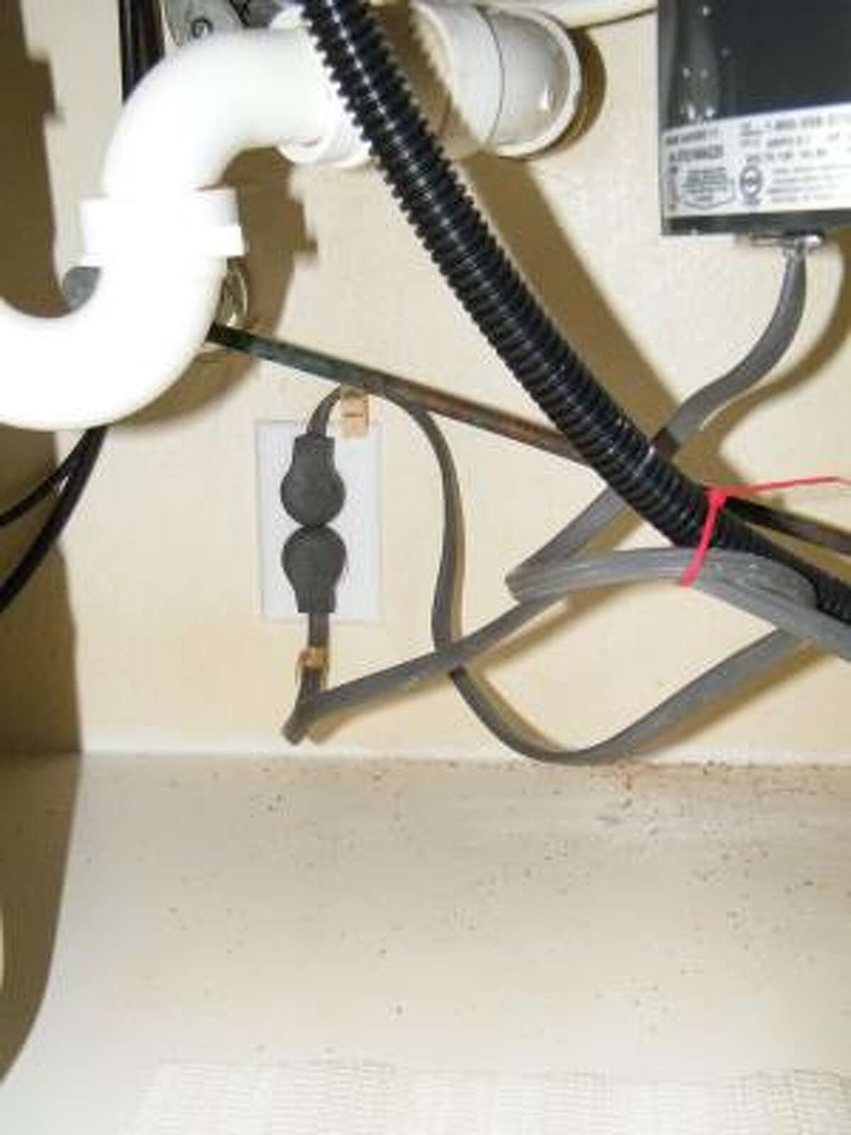 Electrical outlet tab secret to appliances operating independently