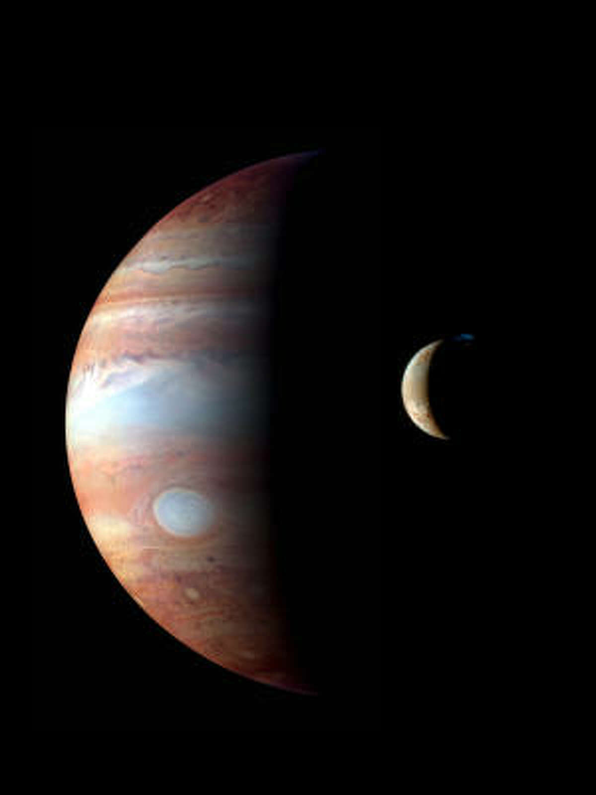 This image of Jupiter and its moon, Io, are part of the Houston Symphony's concert The Planets: An HD Odyssey.