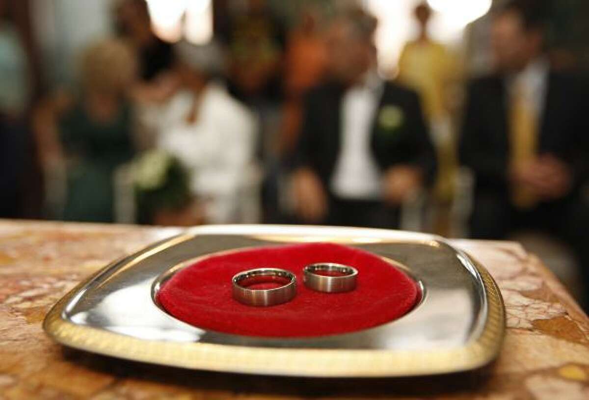 Picking out wedding rings is one romantic aspect of getting married. Preparing and signing a prenuptial agreement isn't. But having one in hand may be worth it later.