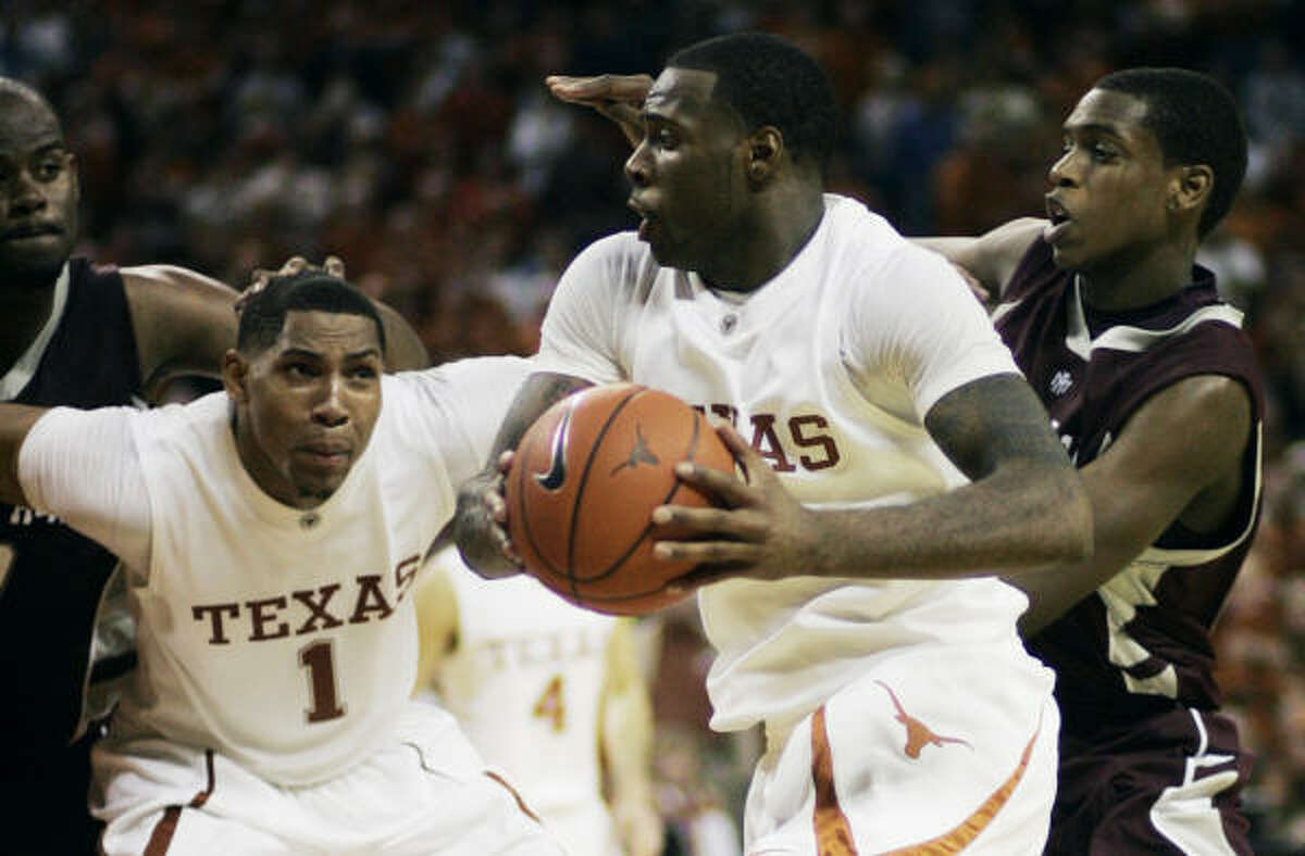 Texas A&M freshman Khris Middleton, right, went from watching Texas forward Damion James, center, on television last year to guarding him this season.