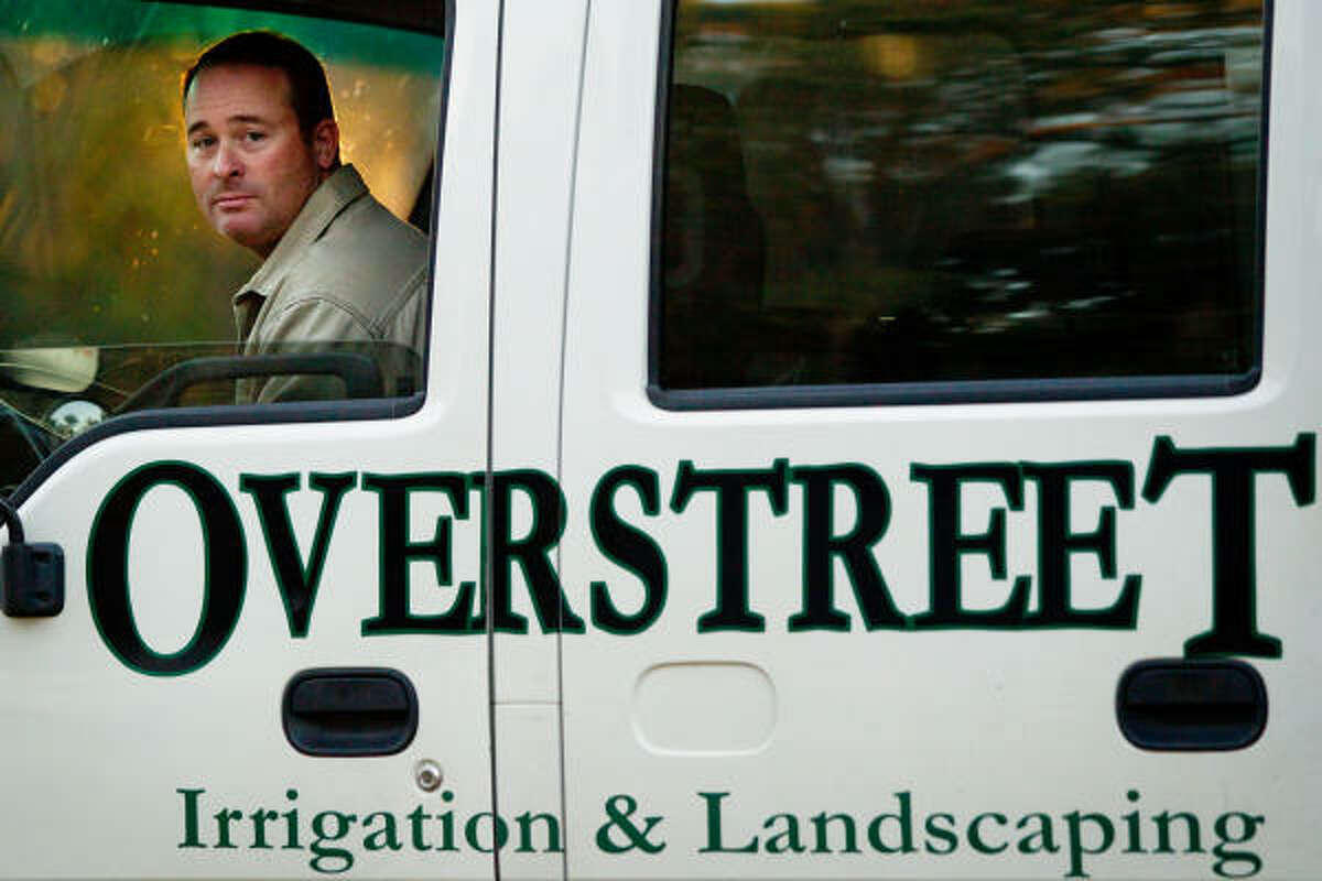 Tony Overstreet Jr. works in his family's landscaping and lawn maintenance business in Gulf Shores, Ala. Tony and Margo Overstreet said they filed a well-documented claim for their business losses, including canceled contracts, for a total of $128,000. The claim was rejected.