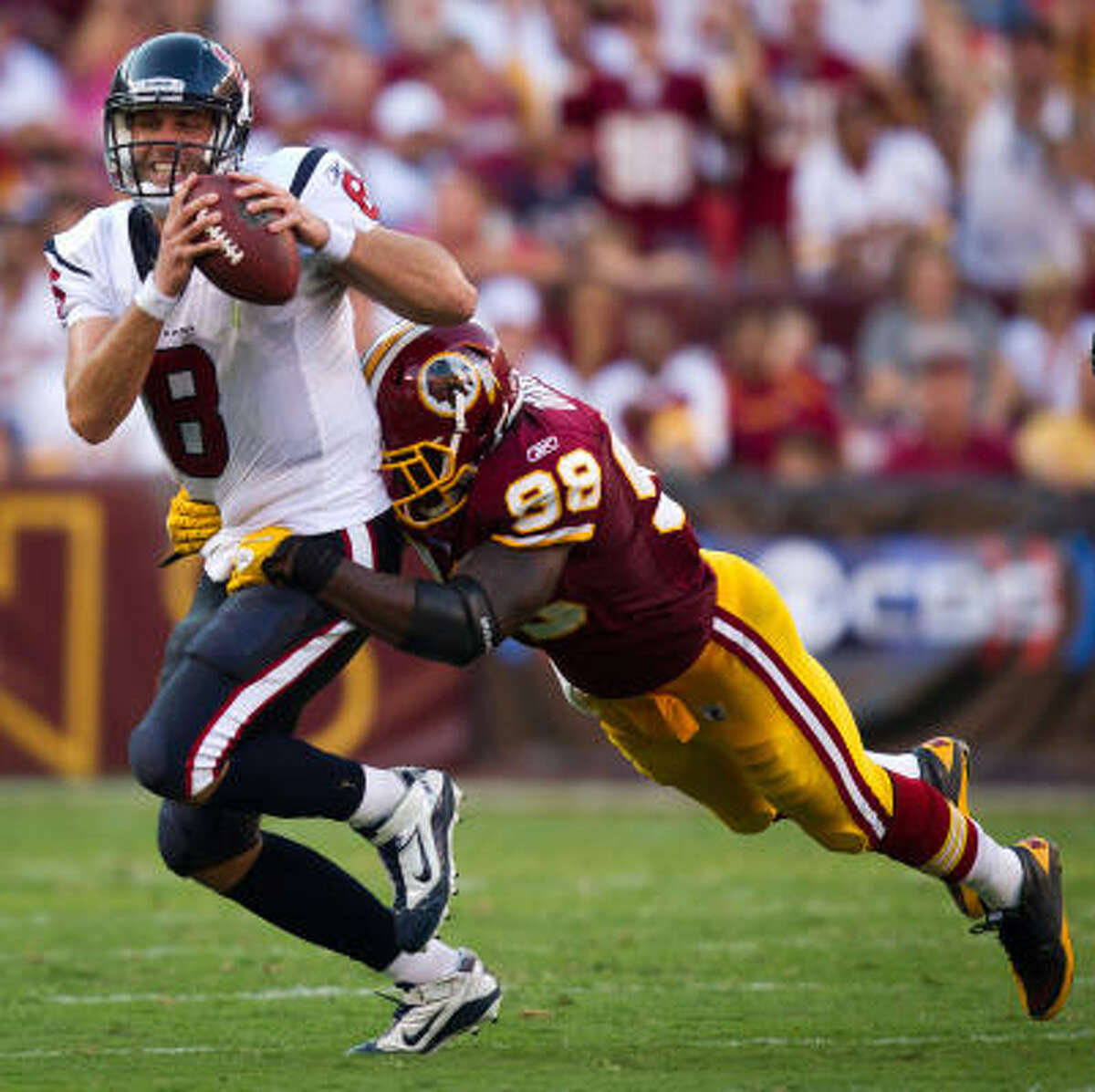 Texans quarterback Matt Schaub is sacked by Redskins linebacker Brian Orakpo in the second half. Schaub was sacked five times during the game.