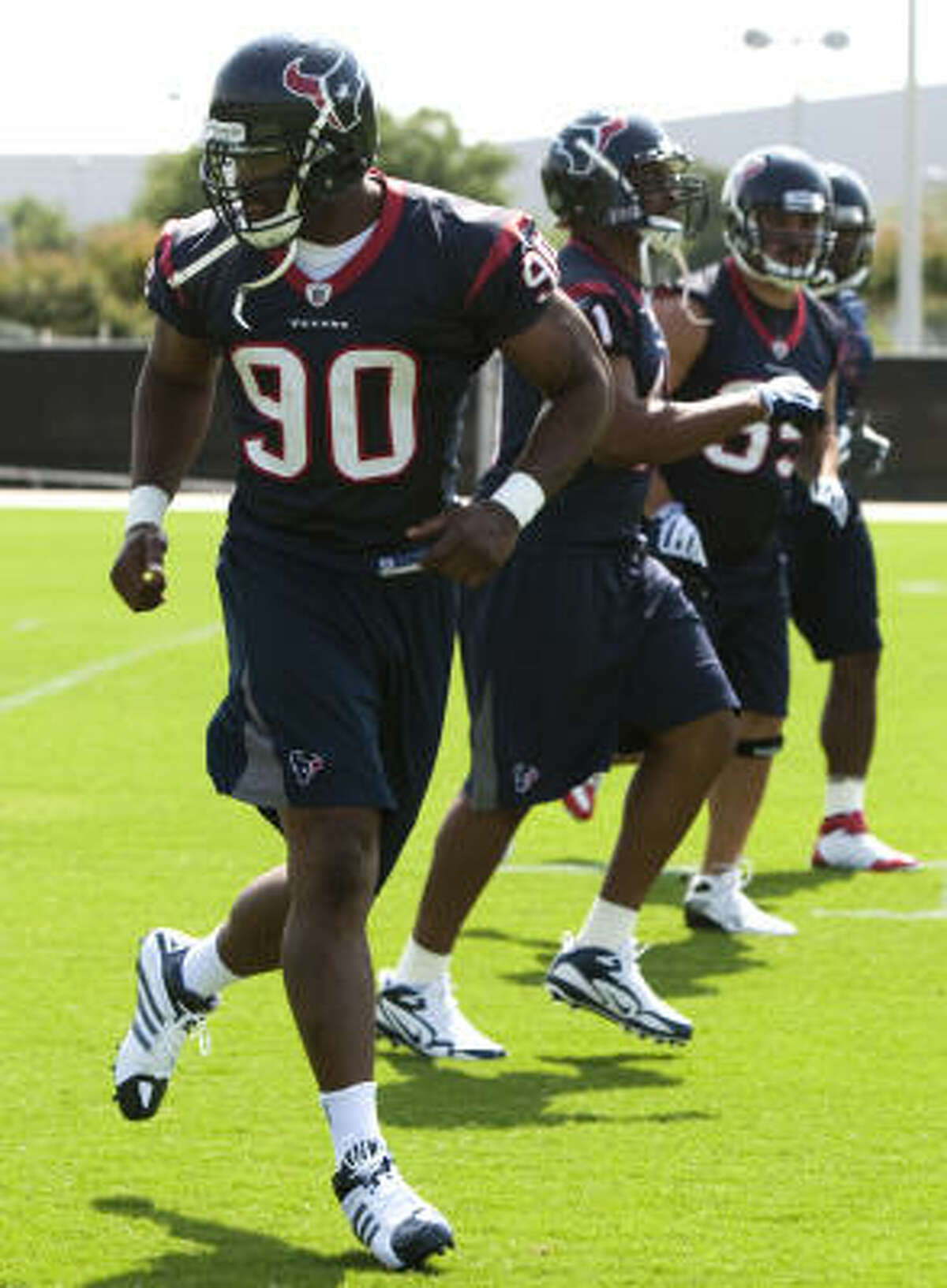 Mario Williams, above, and the Texans' three other starting defensive linemen lost a combined 59 pounds during the offseason.