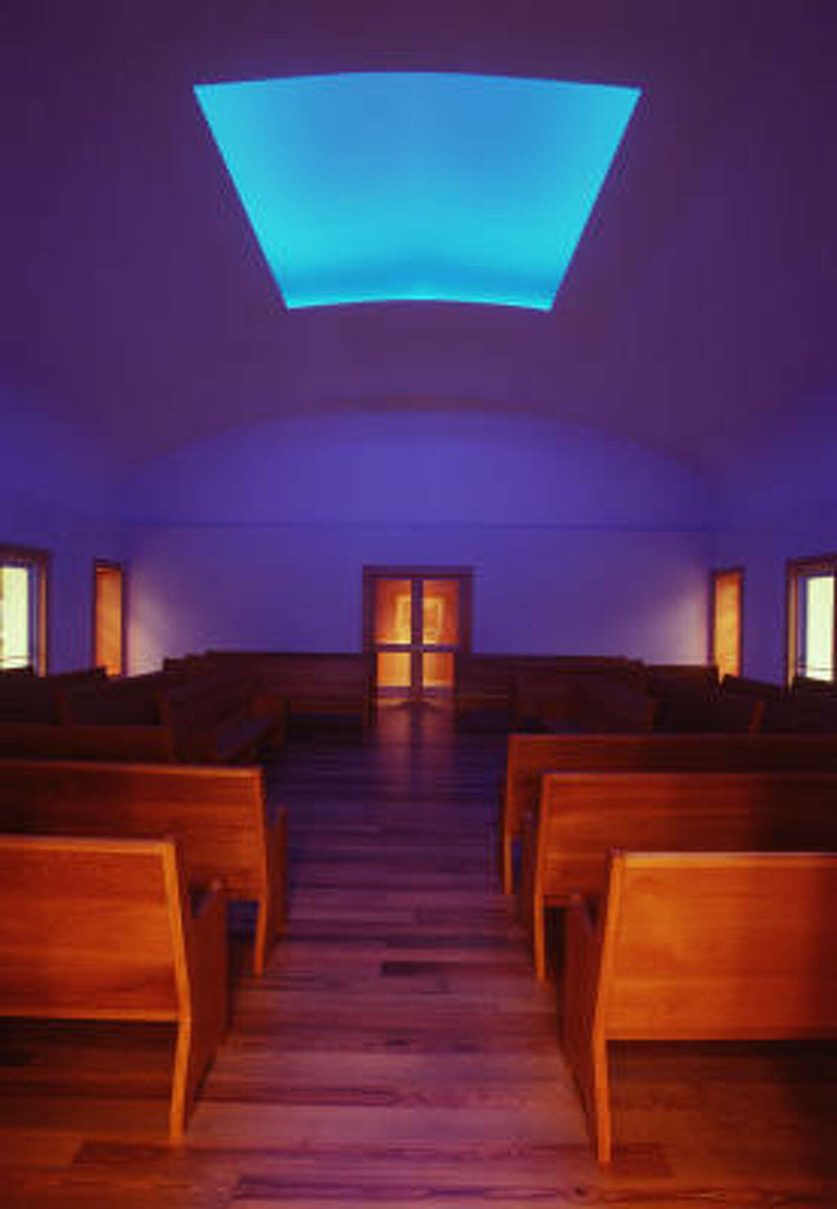 Photos of artist James Turrell's Skyspace from before the roof repairs show the diffferent qualities of light the work lets into the Live Oak Friends Meeting House.