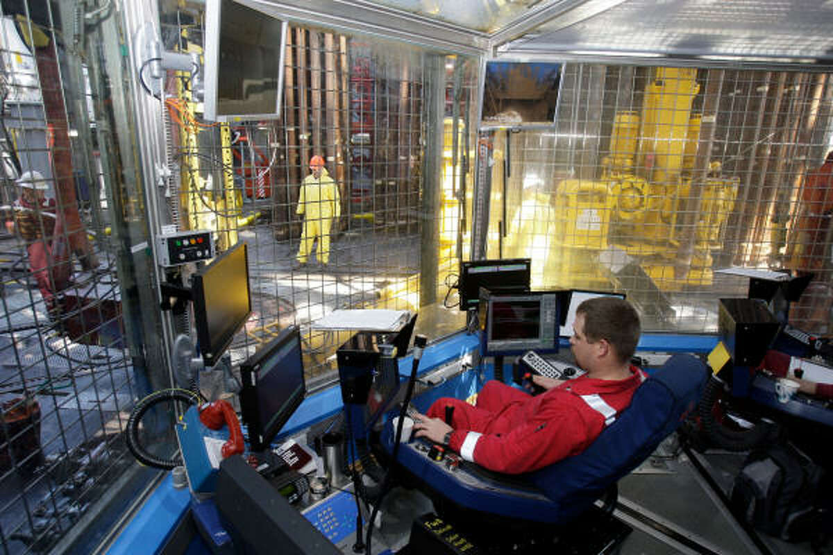 Ray Pittman controls the main drilling functions from a cyber chair on Discoverer Inspiration.