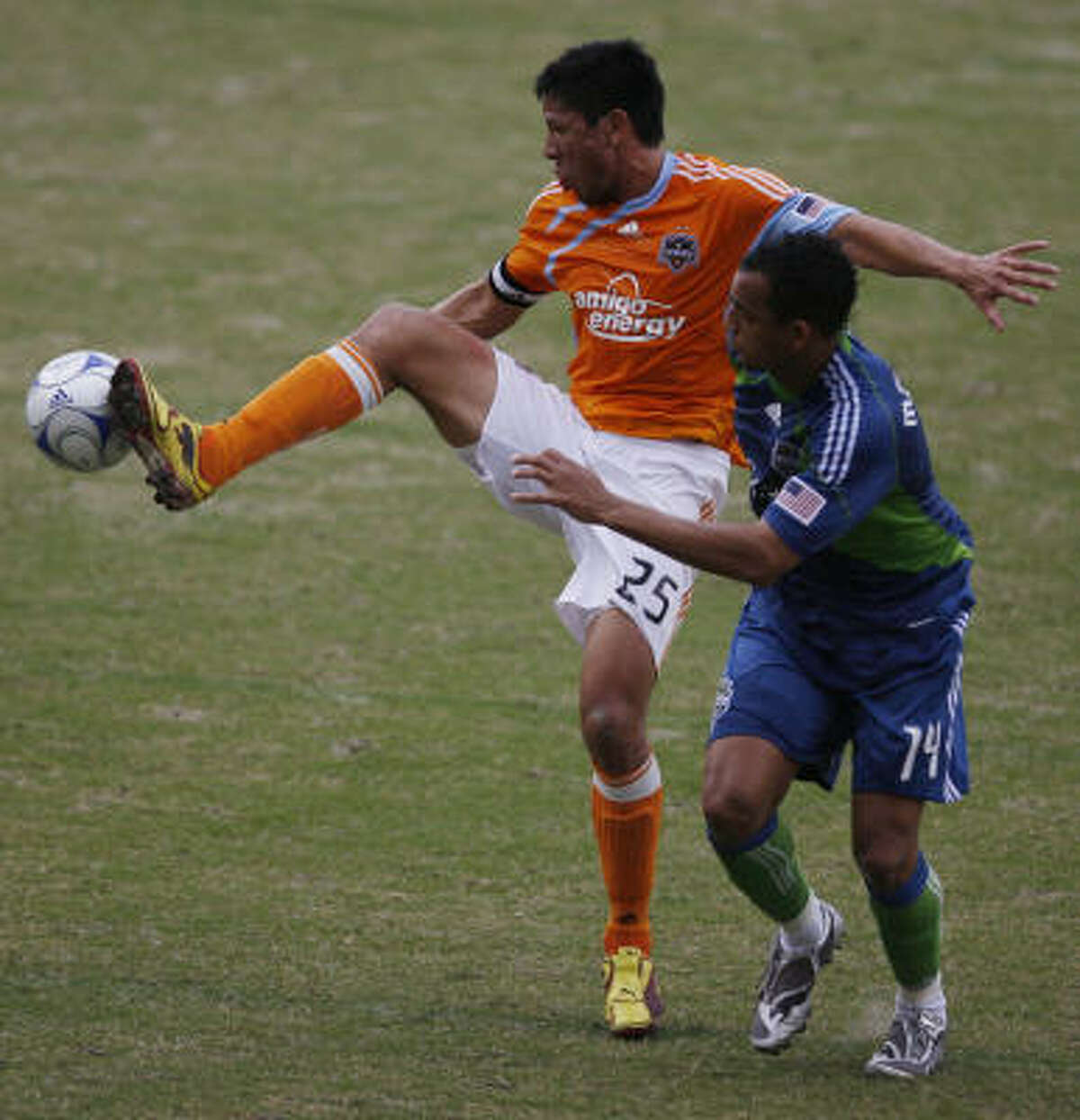 Dynamo forward Brian Ching, left, was one of two commissioner's picks for the MLS All-Star Game.