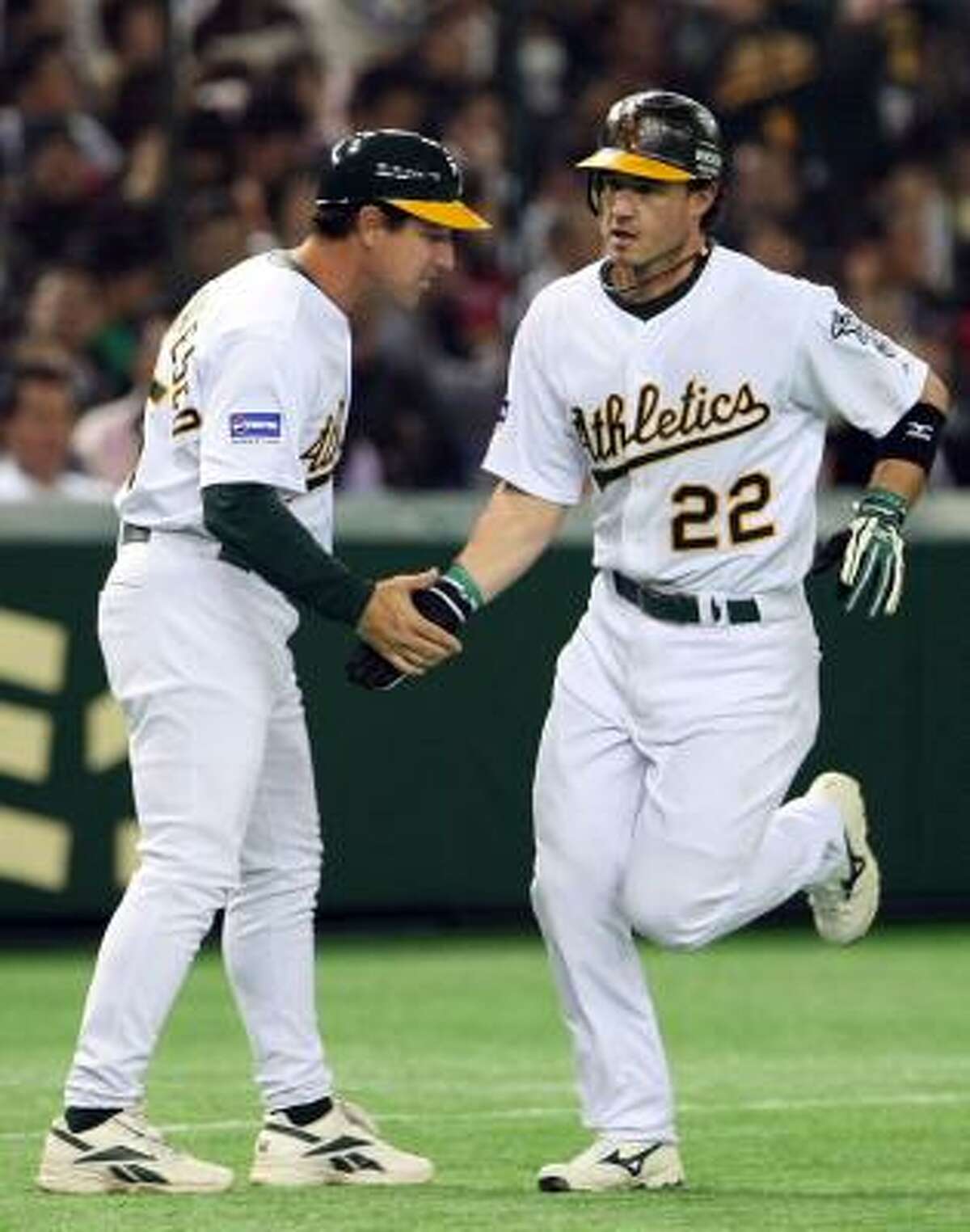 Tony DeFrancesco, left, served as third base coach for the A's in 2008.