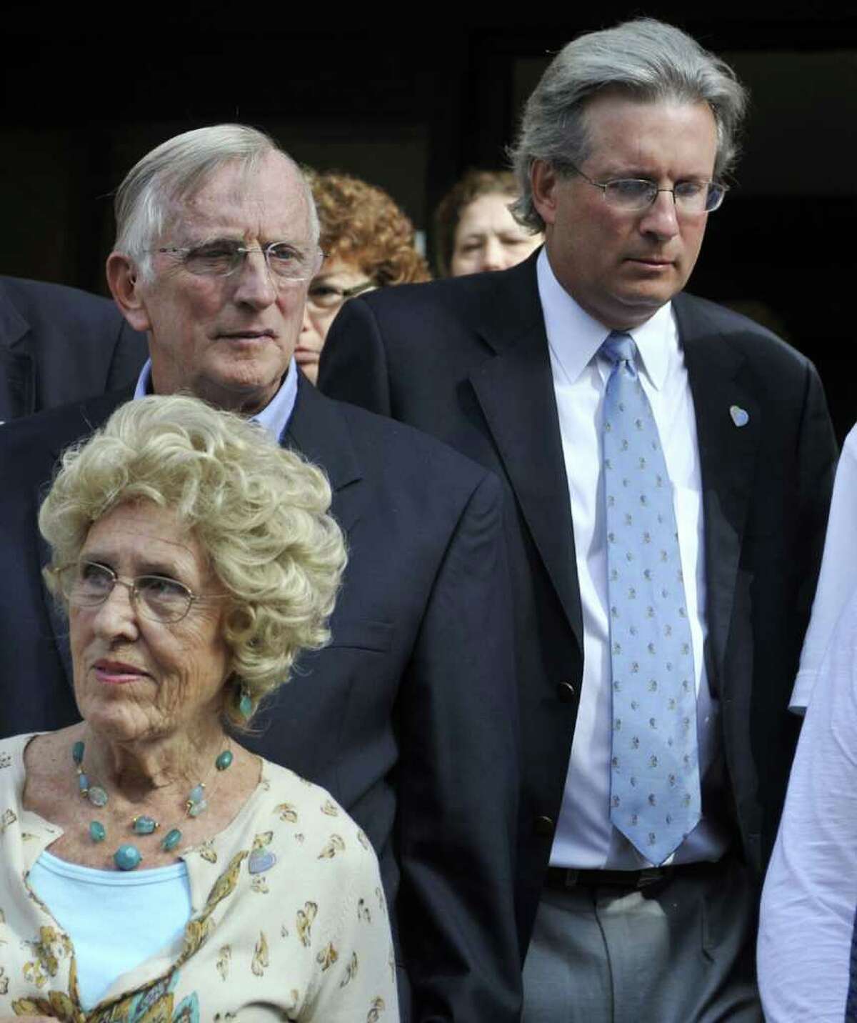 Dr. William Petit Jr., right, leaves court with his father, William Petit, left, and his mother-in-law Marybelle Hawke, bottom left, after the first day of the trial of Steven Hayes at Superior Court in New Haven, Conn., on Monday, Sept. 13, 2010. Prosecutors allege Hayes and Joshua Komisarjevsky killed Jennifer Hawke-Petit and her two daughters, 17-year-old Hayley and 11-year-old Michaela, in their Cheshire, Conn. home in July 2007. (AP Photo/Jessica Hill)