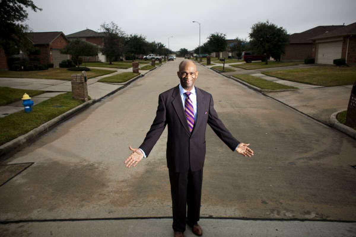 Pastor Kirbyjon Caldwell, who has a Wall Street background, is still building amid a real estate slump. This Corinthian Pointe street is part of Pointe 2.3.4.