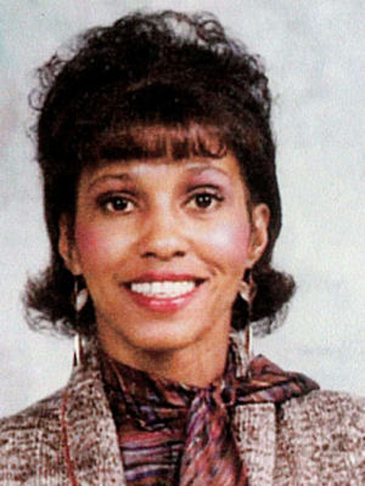 Retia Lafaye Long was found strangled on a stairway behind a church building.