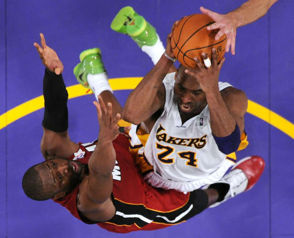 Heat 96, Lakers 80 Lakers guard Kobe Bryant (24) struggled in Saturday's game against the Heat, scoring just 17 points on 6-of-16 shooting.