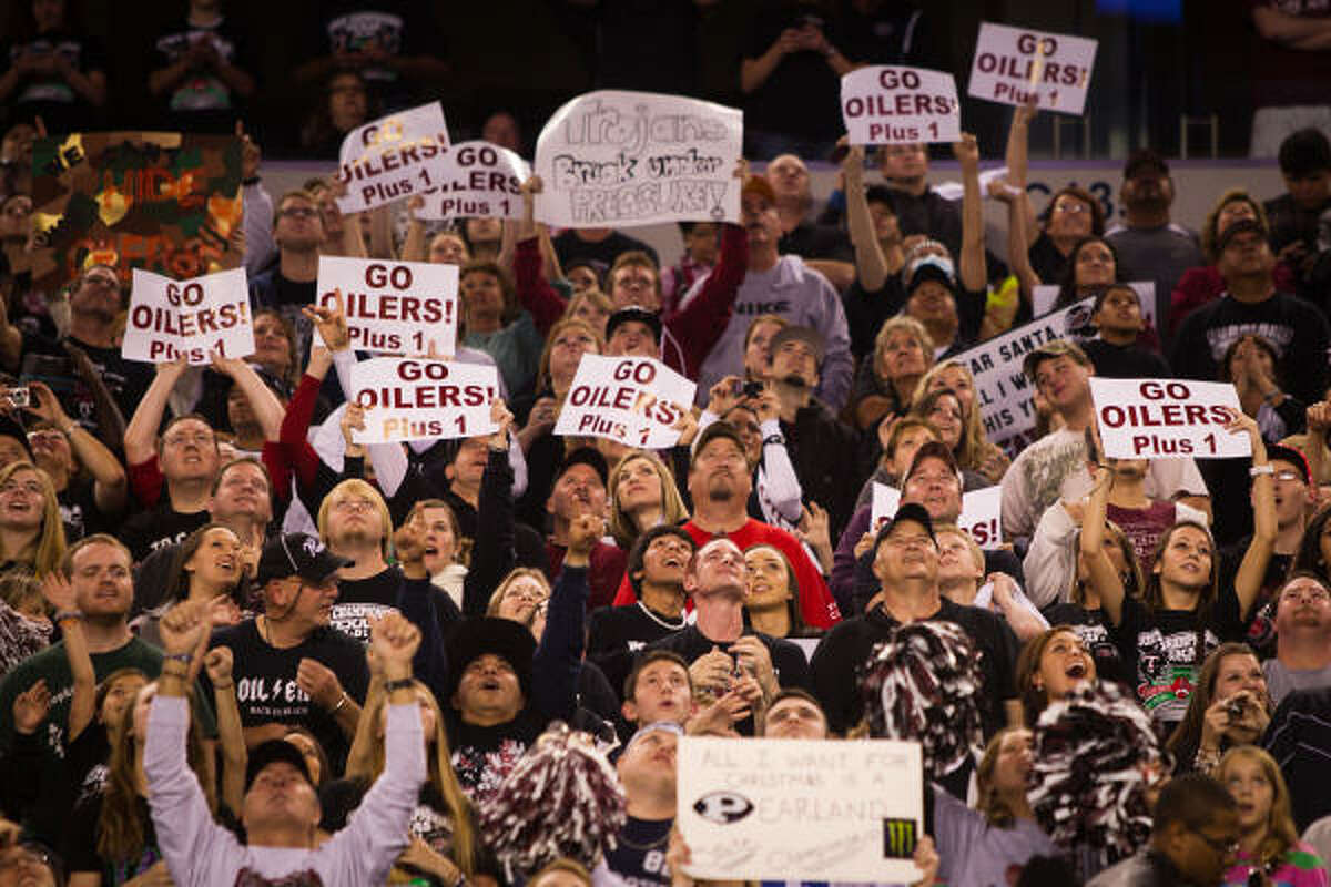 Dec. 18 Pearland fans cheer on their team before Saturday's Class 5A Division I state championship game at Cowboys Stadium in Arlington. Pearland beat Euless Trinity 28-24 to claim its first state championship.