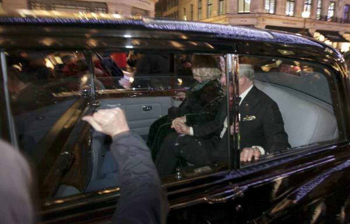 Britain's Prince Charles and Camilla, Duchess of Cornwall, react as their car is attacked, in London, Thursday, Dec. 9, 2010. Angry protesters in London attacked the prince's car in Regent Street, in the heart of London's shopping district. The car then sped off.