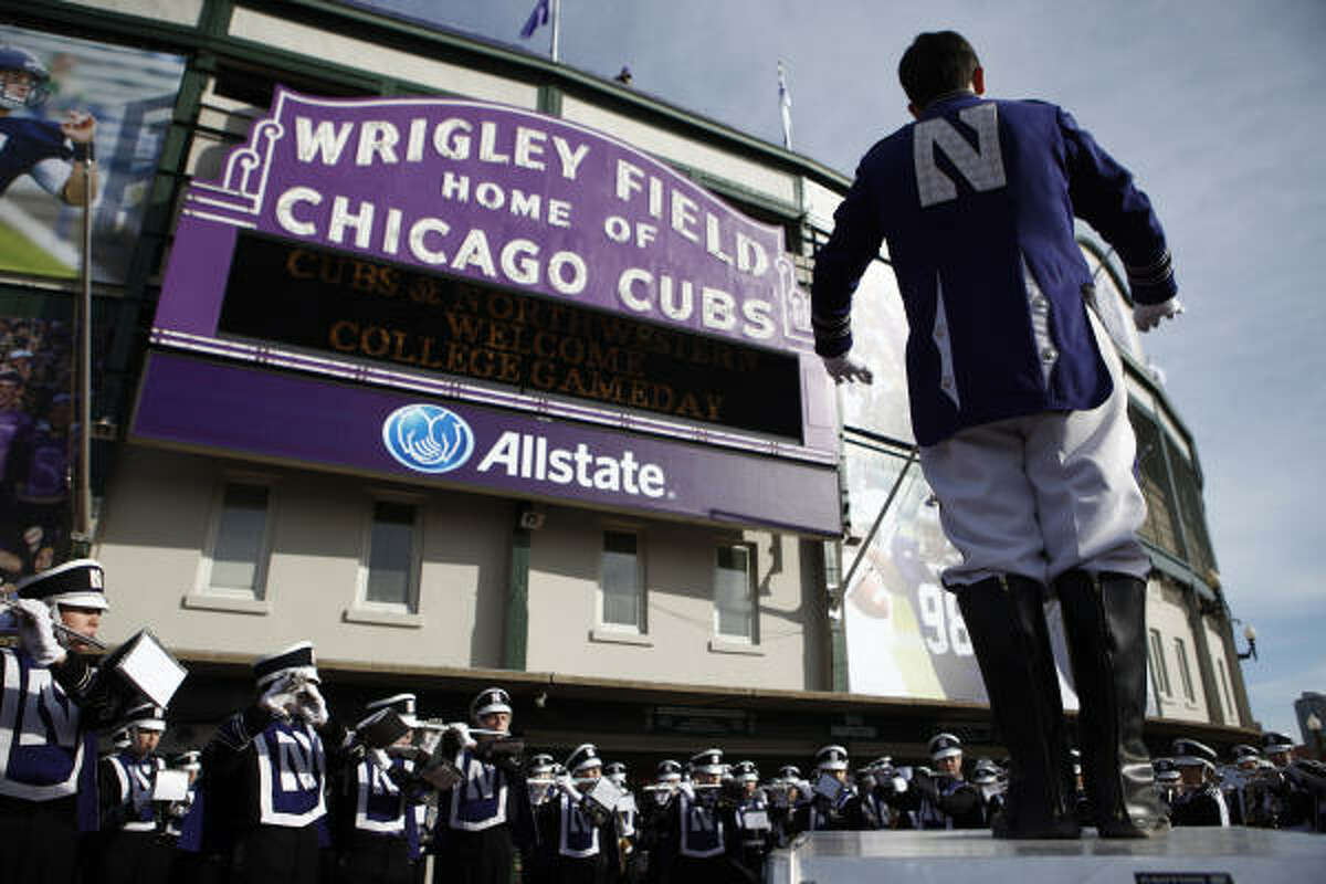 Nov. 20: Illinois 48, Northwestern 27 Northwestern's marching band performs outside Wrigley Field prior to the game.