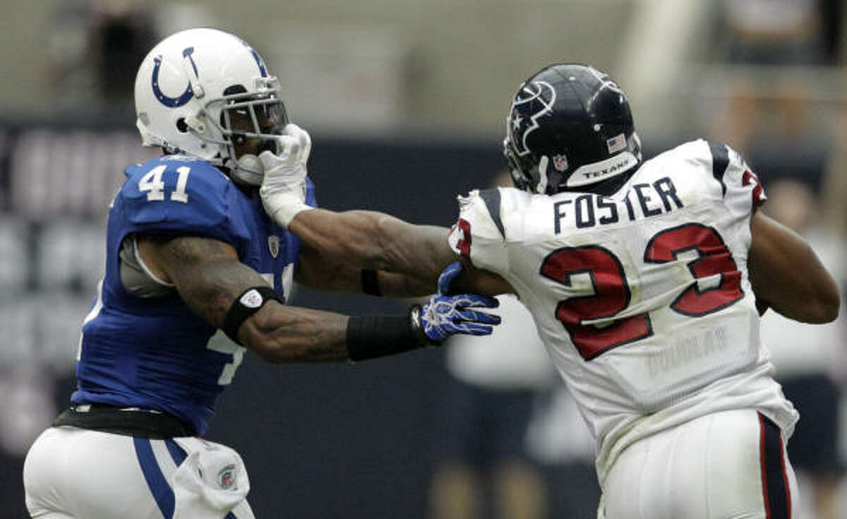 Arian Foster has been fined by the league for this uncalled facemask grab against Colts safety Antoine Bethea.