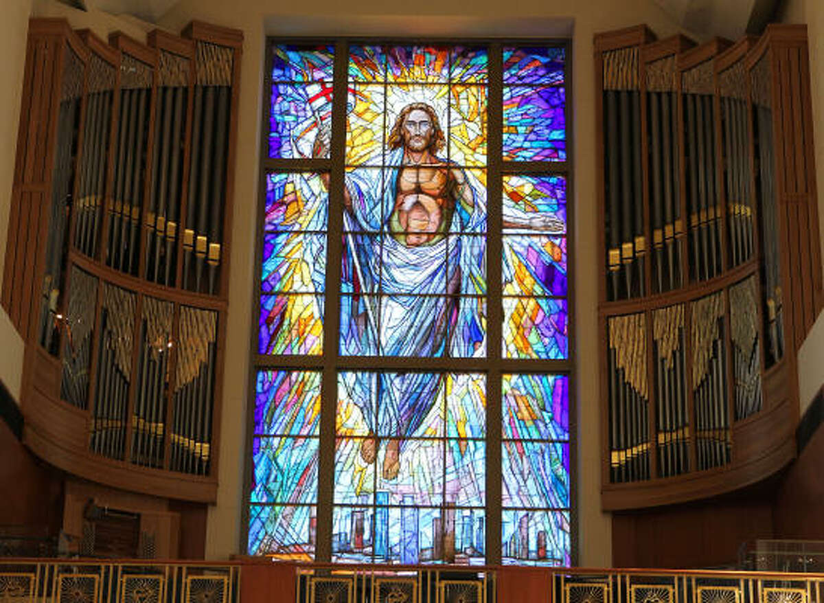 The new pipe organ at the Co-Cathedral surrounds the massive Resurrection Window. The 40-foot-tall, 20-foog-wide stained-glass window is on the facade of the Co-Cathedral.