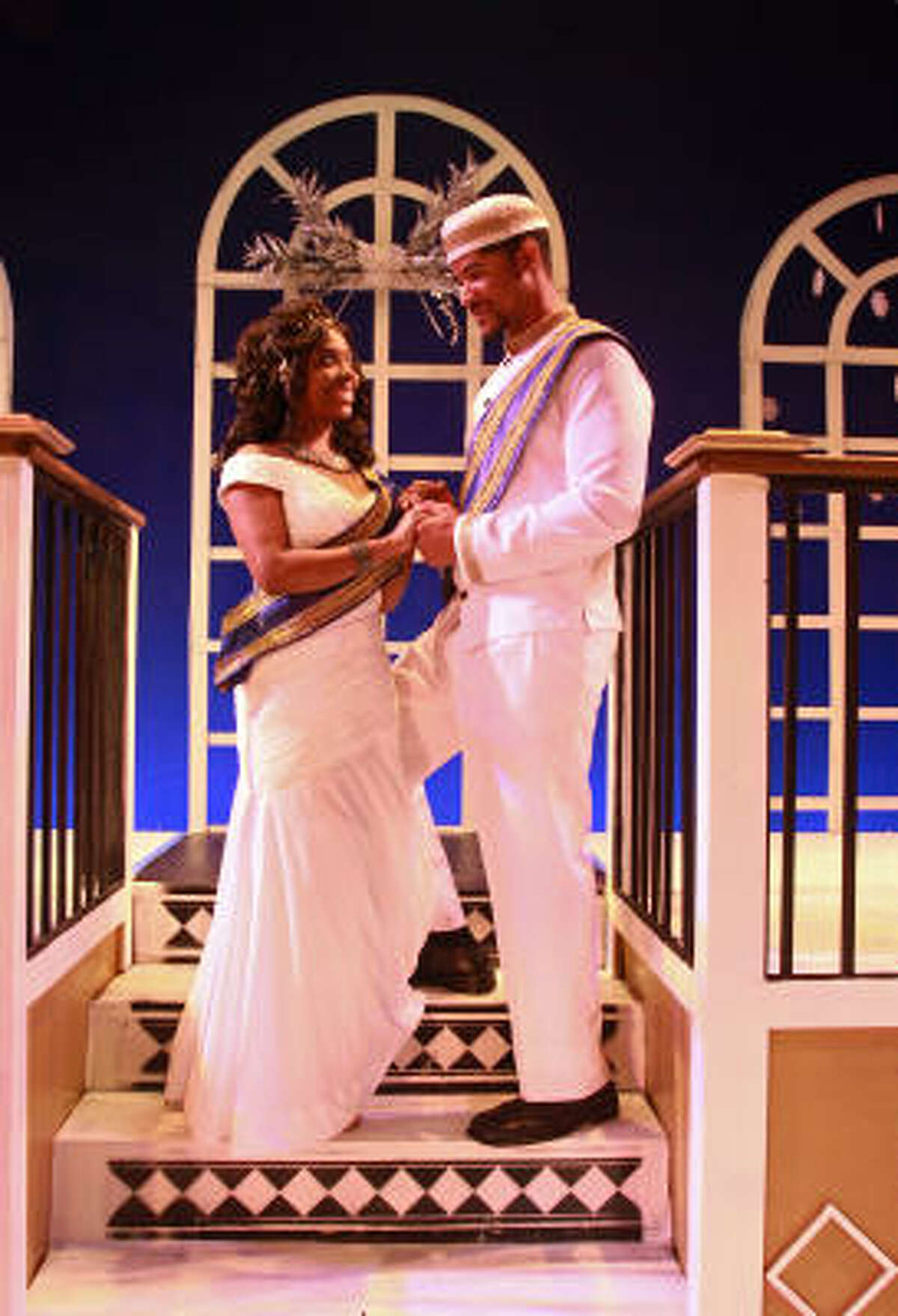 Cinderella (Teacake Ferguson) finds the Prince (Roc Living) in Ensemble Theatre's version of Cinderella.