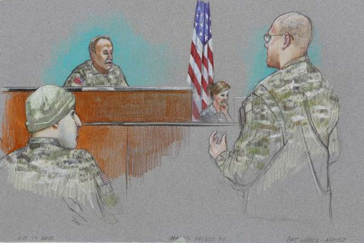 A courtroom sketch depicts defense attorney Lt. Col. Kris Poppe, right, addressing the military judge, Col. James Pohl, while Maj. Nidal Malik Hasan, left, listens Tuesday at Fort Hood.
