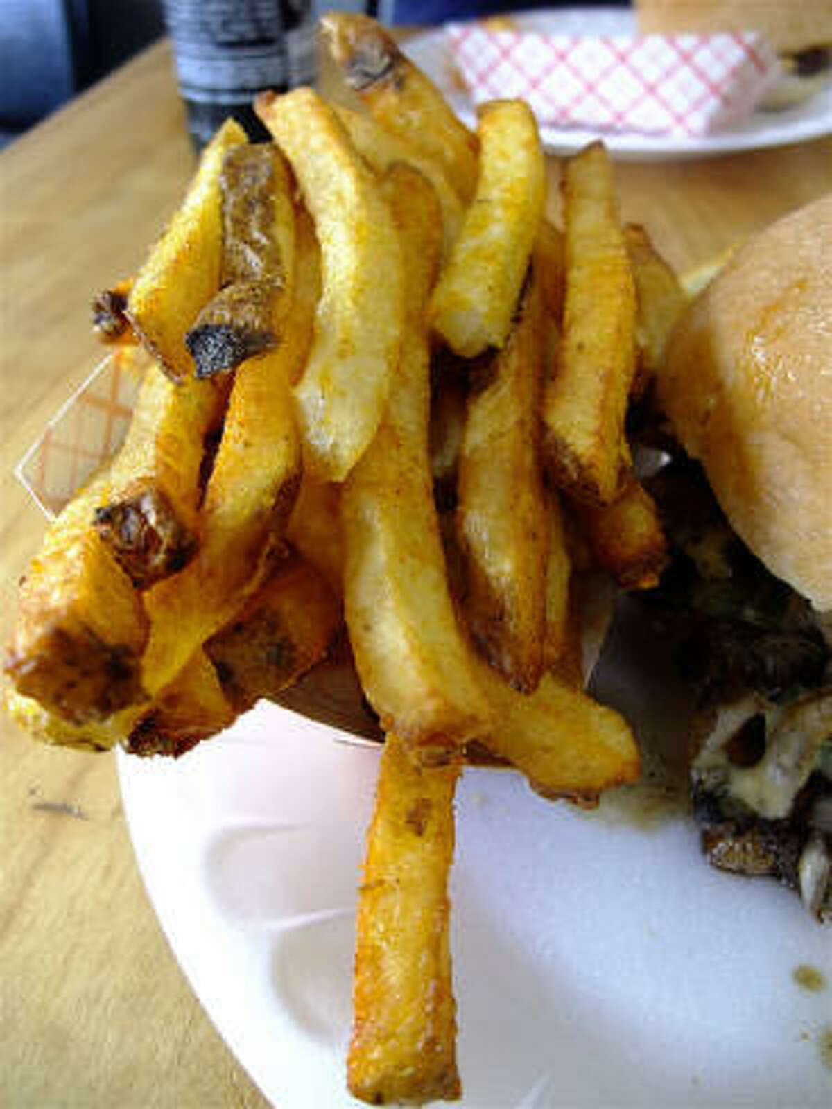 Fresh-cut, double-fried French fries are a prime attraction at Hubcap Grill.
