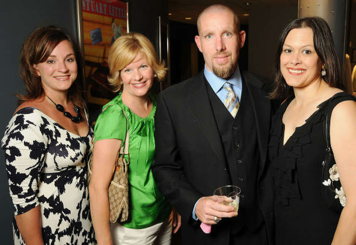 From left: Stephanie Candelari, Elaine Calvert, Robert Griffith and Tracy Griffith at a reception for Bald in the Land of Big Hair, a cancer-themed play at the Main Street Theater.