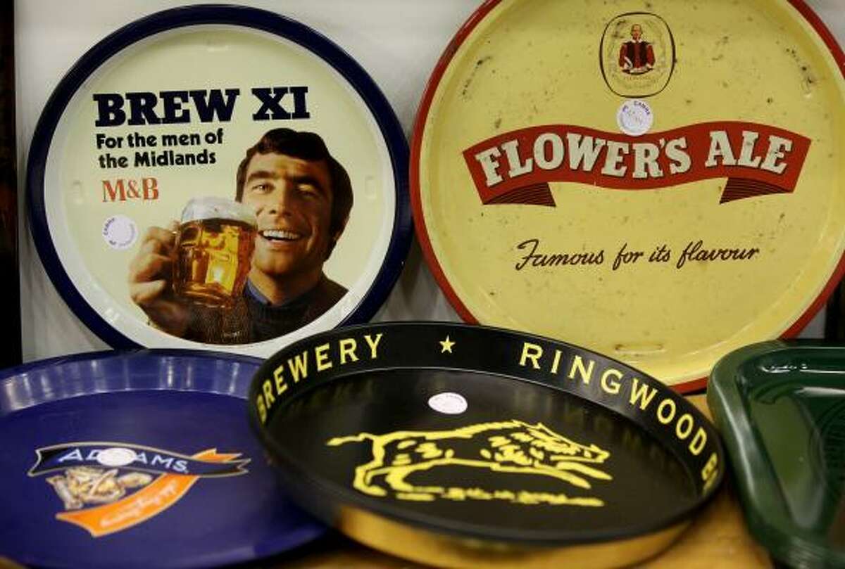 Trays branded with brewery logos on sale at the 'Great British Beer Festival 2010' in Earls Court exhibition centre on Aug. 3, 2010, in London. The festival features more than 500 British real ales, 100 British ciders and 350 beers from around the world.