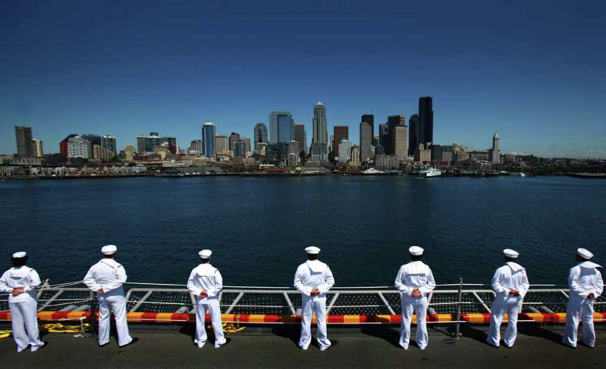 Sailors man the rails during the Seafair Parade of Ships on Wednesday, August 3, 2011 along the Seattle waterfront.