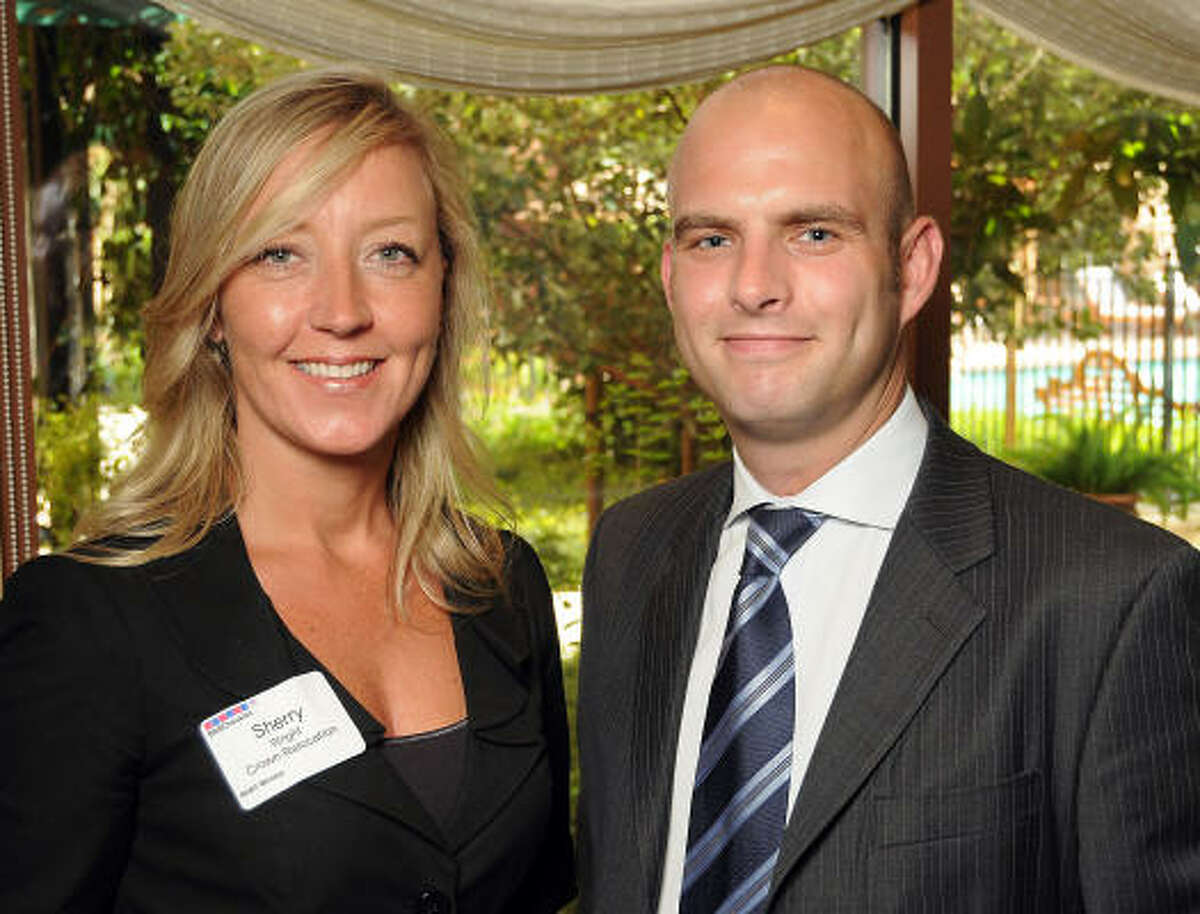 Sherry Wright and Jamie Ferguson at a reception hosted by the British-American Business Council Houston and Continental Airlines at the Hotel Granduca. The event was a kickoff party for the inaugural International Business Awards slated for Oct. 21 at the Hilton Post Oak.