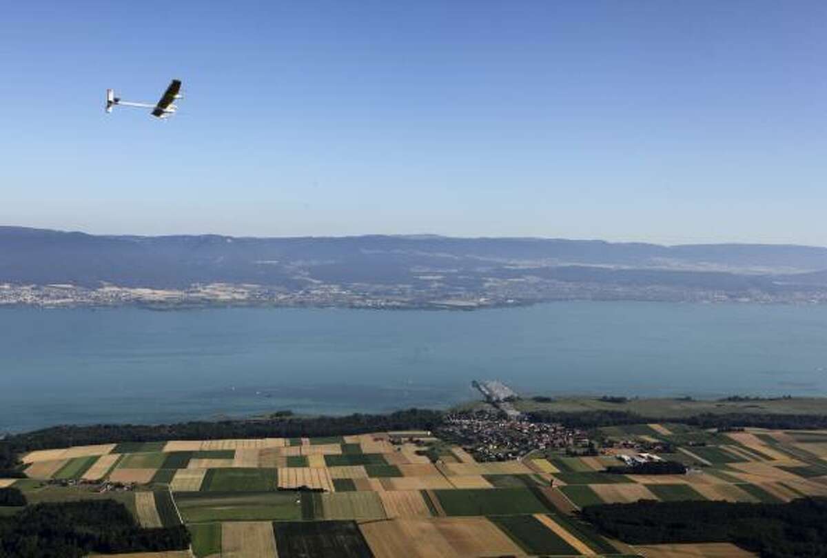 An experimental solar-powered plane completed its first 24-hour test flight successfully Thursday, proving that the aircraft can collect enough energy from the sun during the day to stay aloft all night.