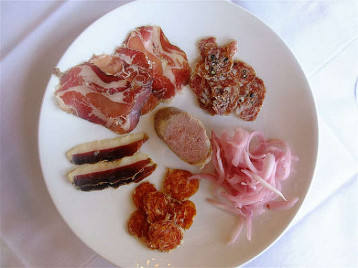 House-made charcuterie plate at Catalan, from chefs Chris Shepherd & Antoine Ware.