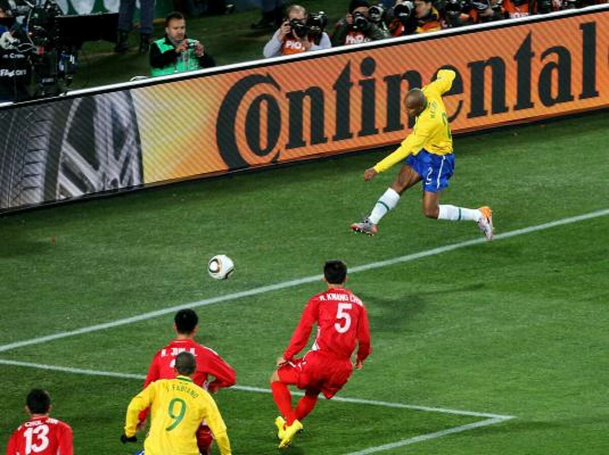 BRAZIL 2, NORTH KOREA 1 Maicon scores Brazil's first goal from a nearly impossible angle at Ellis Park Stadium in Johannesburg.