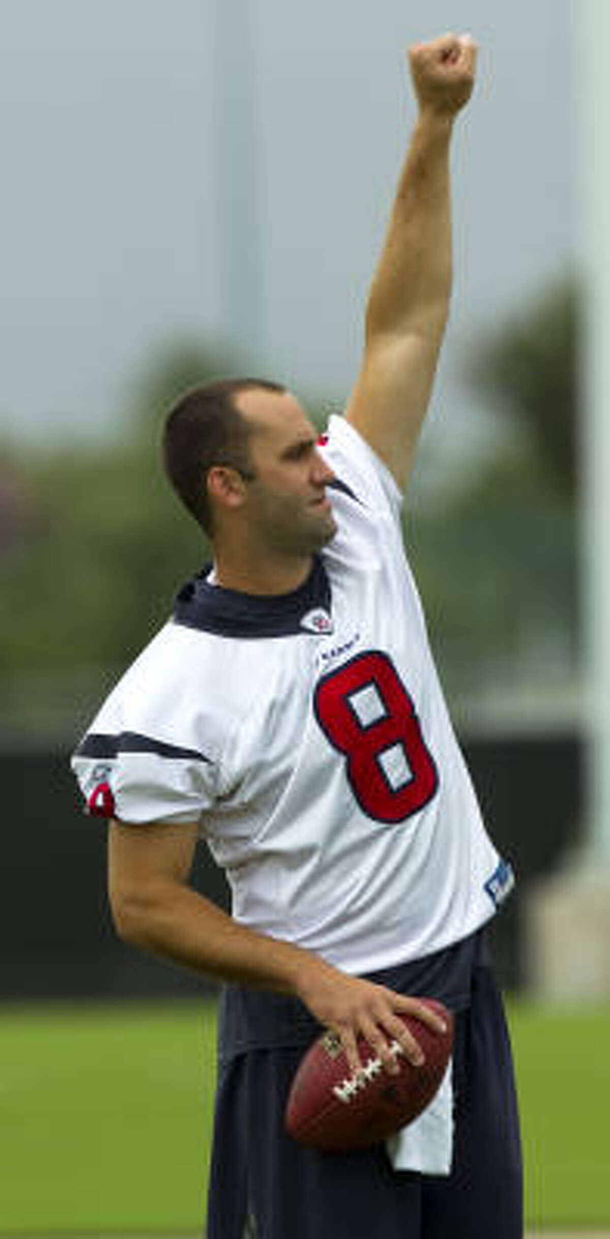 Texans quarterback Matt Schaub signals to a teammate.