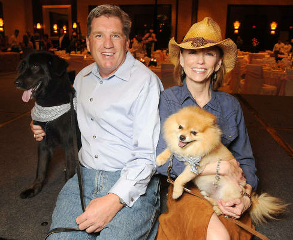 Patrick Gehm with Grayson and Susan Krohn with Finny at Mr. Magoo's "The Best Little Doghouse in Texas" benefitting the Citizens for Animal Protection at the Hilton Americas-Houston.